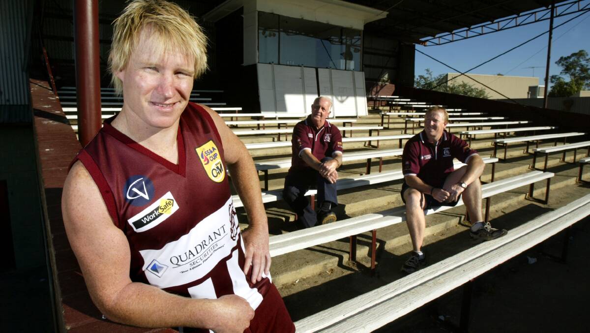 Twitt was appointed captain of Wodonga in 2005 and is pictured with Bulldog life member Jake Elkington and coach Craig Cleary.