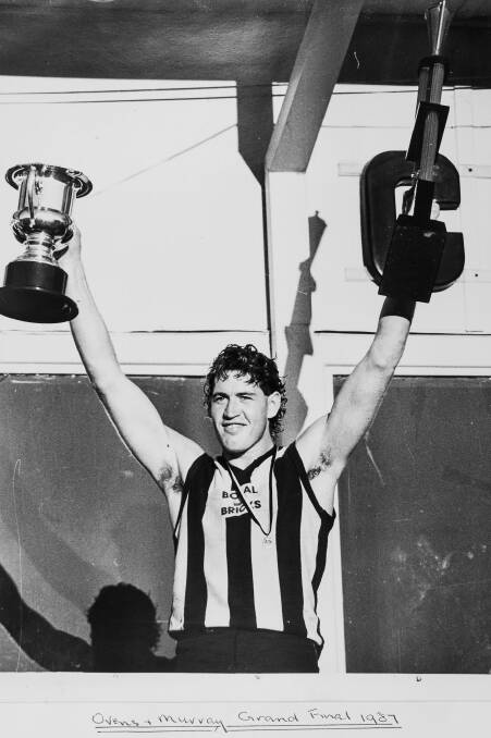 Allen with the spoils of victory after the 1987 decider.