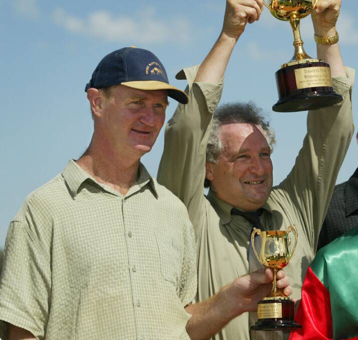 WINNERS ARE GRINNERS: Peter Maher and Terry Doolan with the Wodonga Cup.