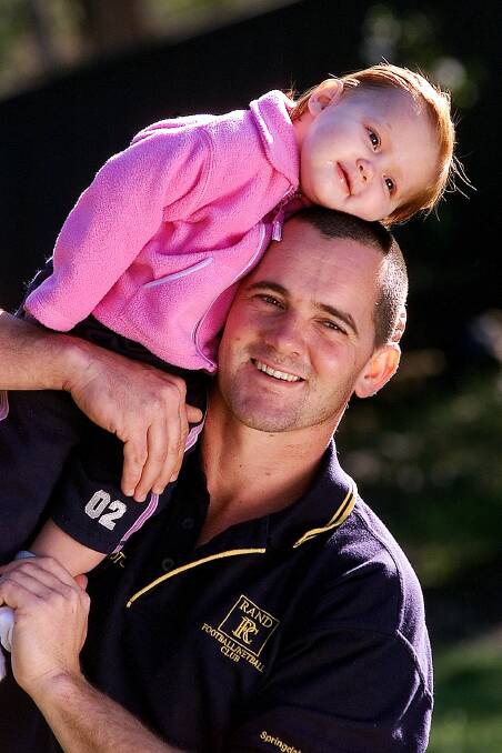 Harvey with his daughter Hollie in 2002.