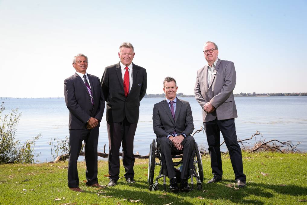 ALL IN: Moira Shire mayor Libro Mustica joins counterparts Pat Bourke, Matthew Hannan and Bernard Gaffney from Federation, Berrigan and Indigo councils to sign a Memorandum of Understanding at Mulwala on Wednesday. Picture: JAMES WILTSHIRE