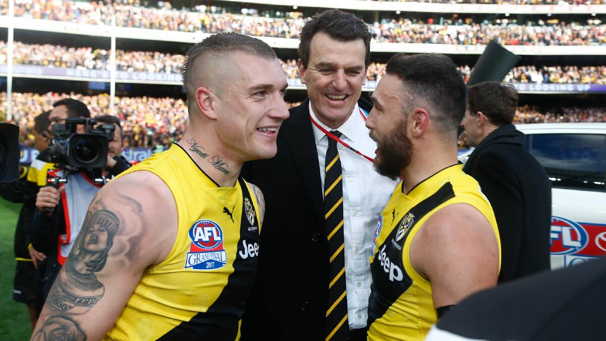 Richmond CEO Brendon Gale celebrates the Tigers' premiership with Dustin Martin and Shane Edwards. Picture: RICHMOND FOOTBALL CLUB