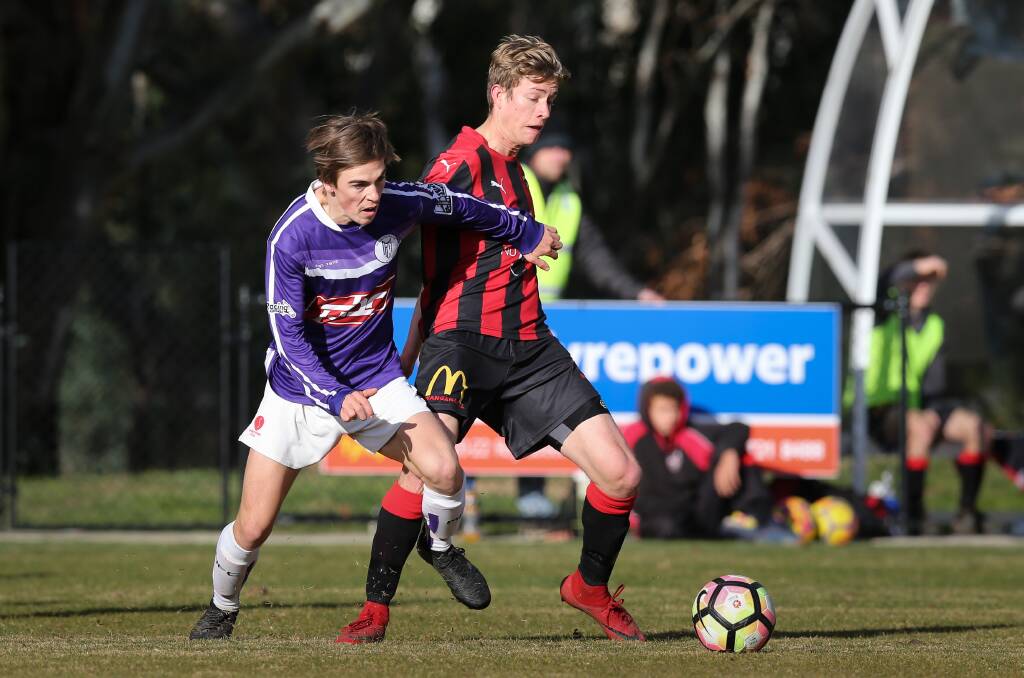 BIG SCARE: Wangaratta young gun Lachlan Campbell (right) left the field in a bad way during last Sunday's quarter-final against Albury United. Picture: KYLIE ESLER