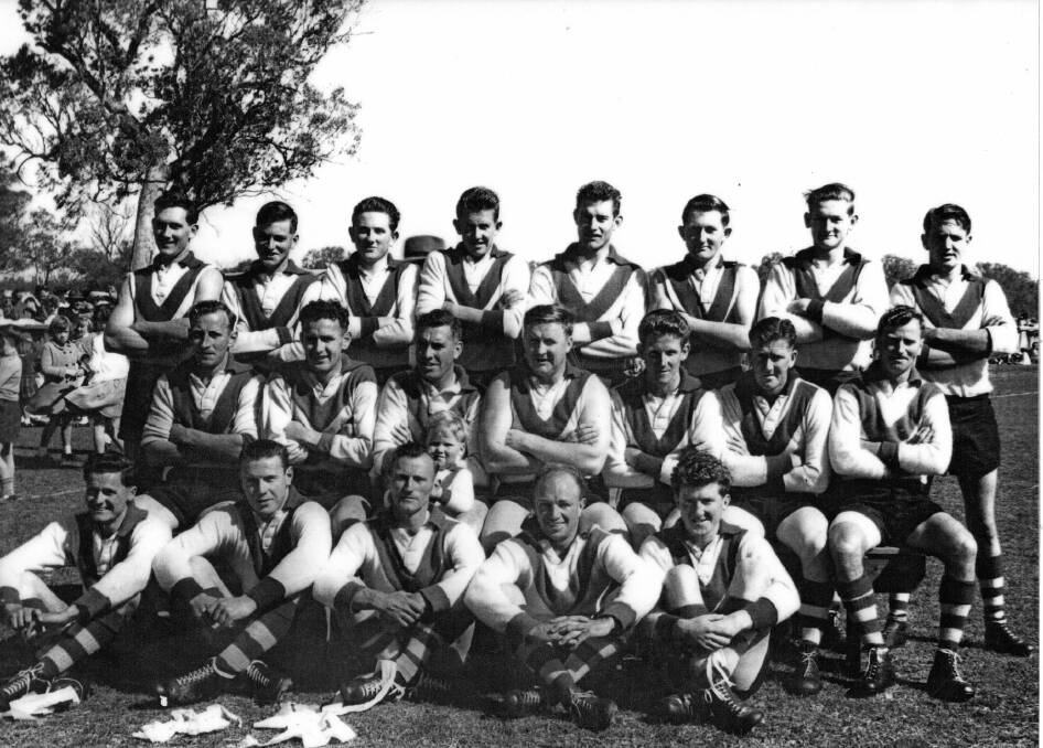 Chiltern Football Club Ovens & King League Premiers 1957. Back row - R Peake, B Peake, A Borrack, F Griffin, D Ryan, I Chant, K Dixon and T Lappin; middle row - J Peake, D Stephenson, G Tate (coach), K Harvey, K Newbound, R Howes and A Peake; front row - V Shelley, R Billman, F Peake, R Hutchinson and R Price. Mascot J Tate.
