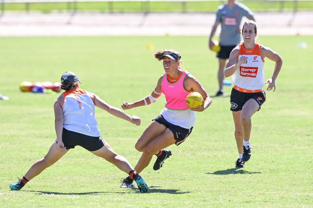 CHANGING PLACES: Aimee Schmidt trains with the GWS Giants at Lavington Sportsground. The AFLW side will depart Albury on Friday. Picture: MARK JESSER