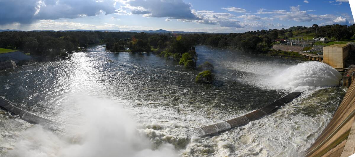 LET IT FLOW: Water streams from Hume Dam on Monday as part of a managed release by Murray-Darling Basin Authority. Picture: MARK JESSER