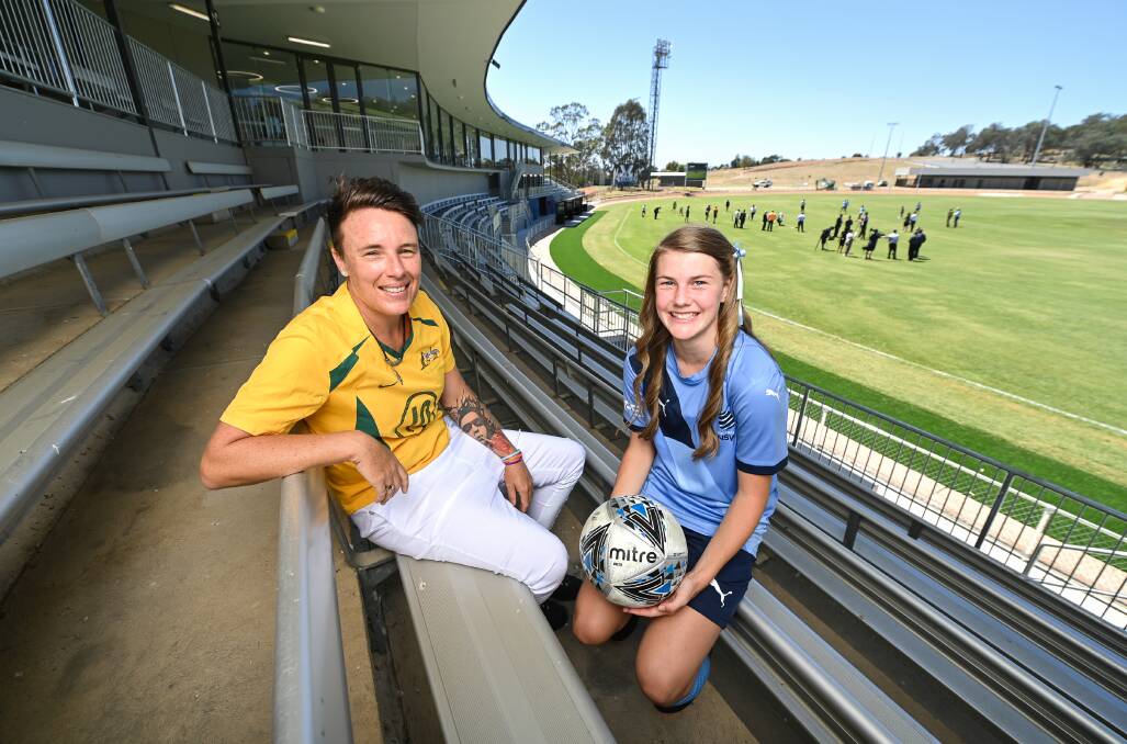 HELPING HAND: Former Matilda Joey Peters and Albury's Ashleigh Carty, who has aspirations to one day play for Australia. Picture: MARK JESSER