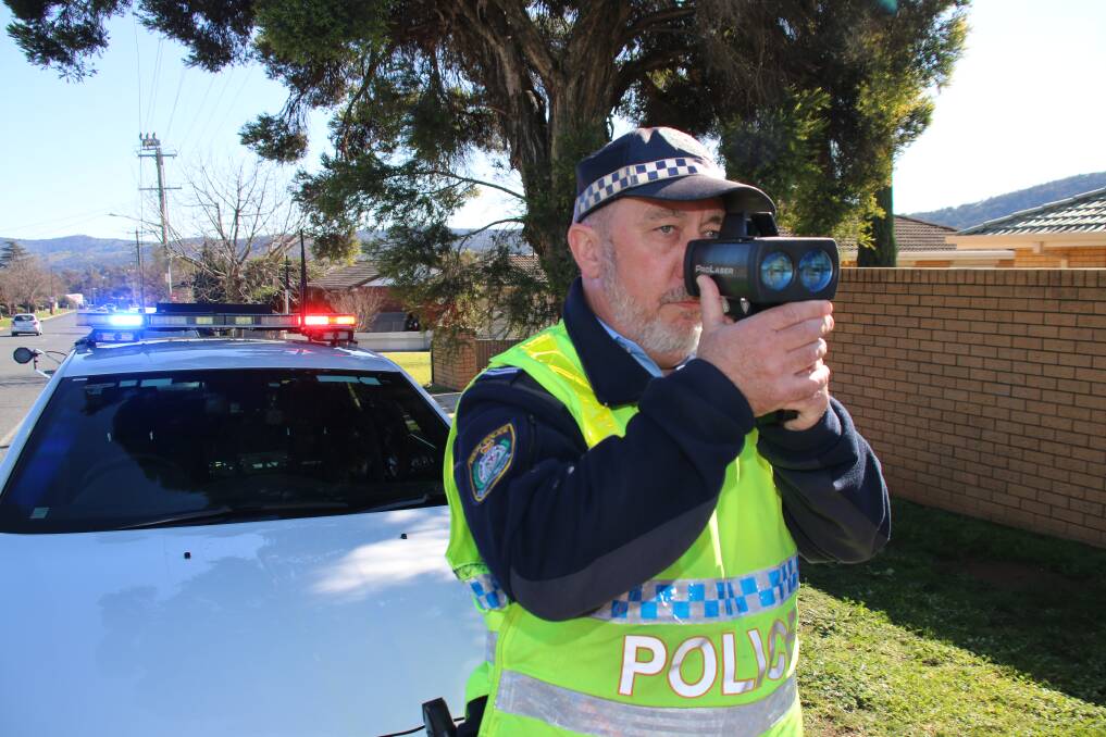 SLOW DOWN: Acting Sergeant Nick Fahy monitoring drivers in Vickers Road yesterday. Police have asked the Albury community to engage with the council to nominate the city's worst streets for speeding