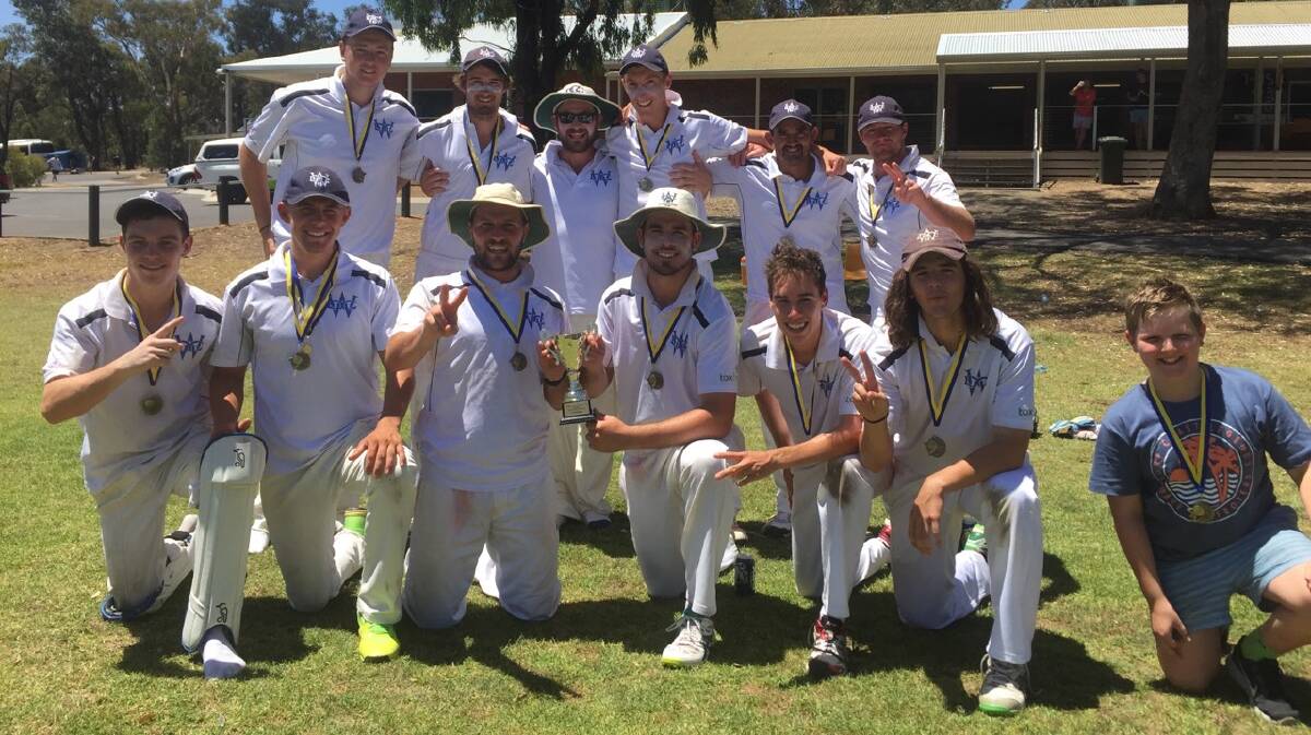 WINNERS ARE GRINNERS: Wangaratta and District Cricket Association celebrate after defeating Colac in the division two Country Week final at Bendigo.