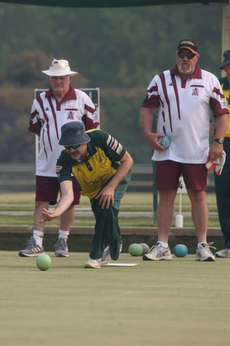 ON THE MONEY: North Albury's Andrew Hirst sends down a bowl during the finals of the Albury and District open triples at Culcairn. Pictures: TARA TREWHELLA