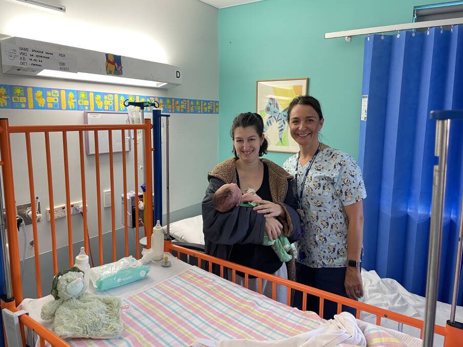 Albury mother Tegan French with three-week-old son Spencer Irons and Albury Wodonga Health nurse unit manager for paediatrics Jo Owen. Picture by Beau Greenway
