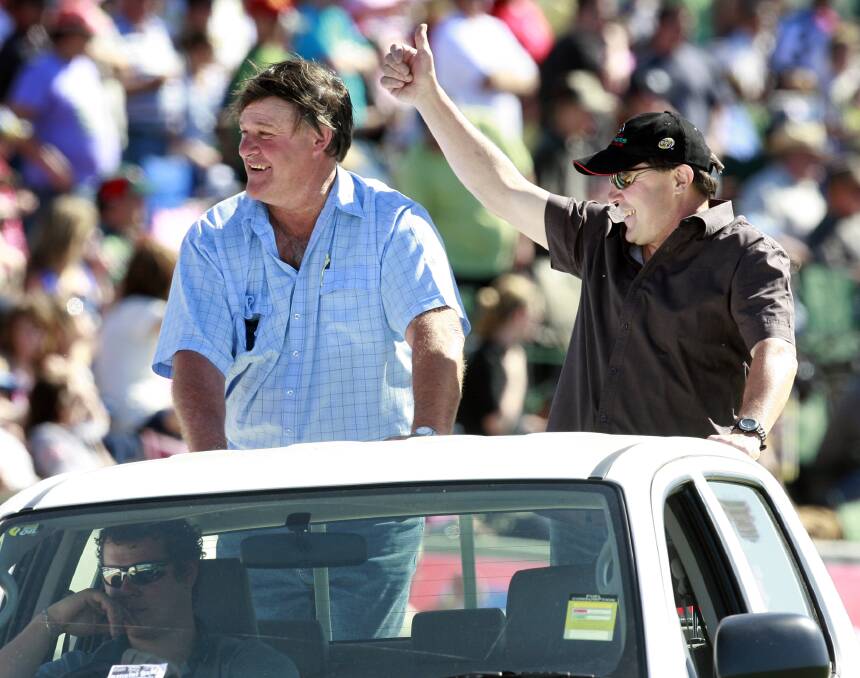 FLASHBACK: Wangaratta Rovers great Merv Holmes and Lavington's Ralph Aalbers acknowledge the crowd during the 2008 Ovens and Murray grand final parade as inductees into the league's Hall of Fame.