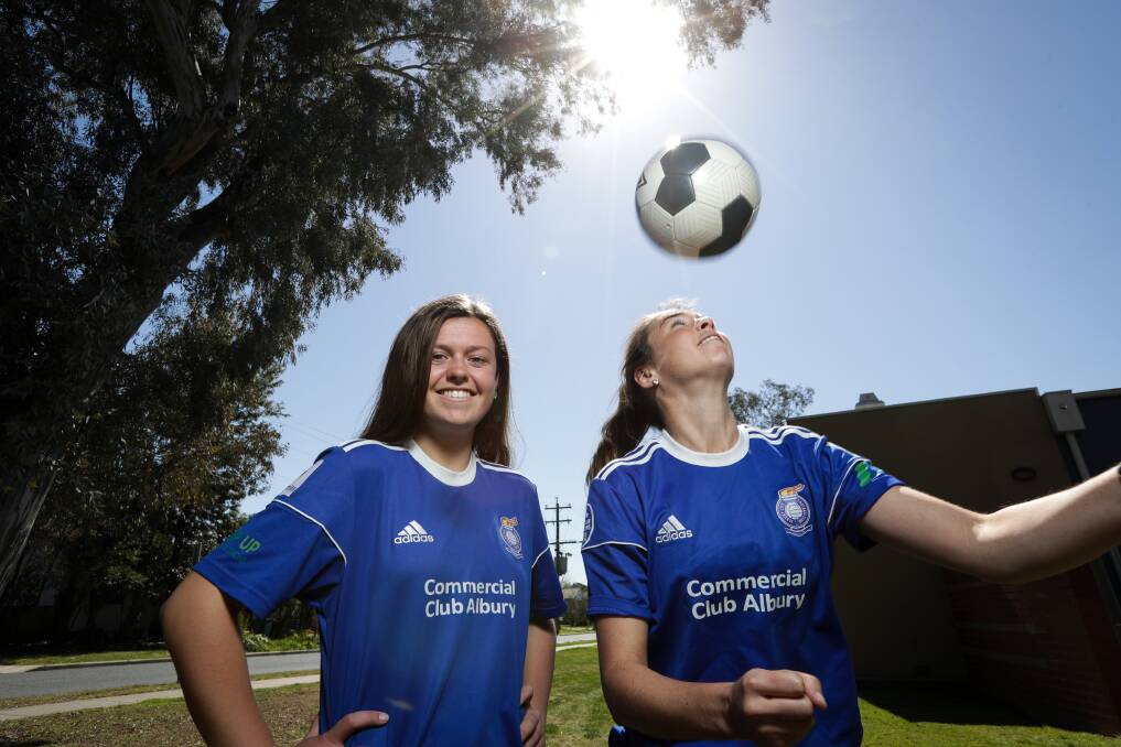 MASTER AND APPRENTICE: Xavier High School student Montanna Mathews and her PE teacher Amy Martin are set for Albury's City clash with Wangaratta in the AWFA senior women's cup final on Sunday. Picture: JAMES WILTSHIRE