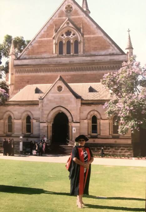 CONGRATULATIONS: Dr Eileen Petrie out the front of Bonython Hall University of Adelaide at her PhD graduation. 