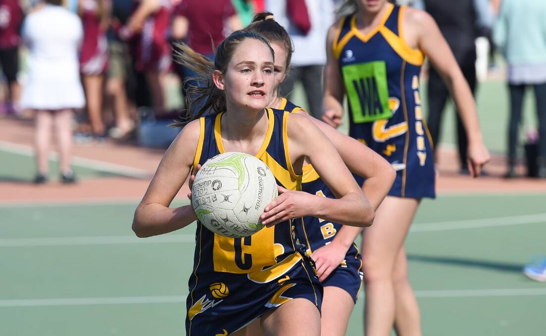 OPEN SPACE: Albury's Maggie St John looks for a teammate during last year's Albury Netball Association representative tournament. 
