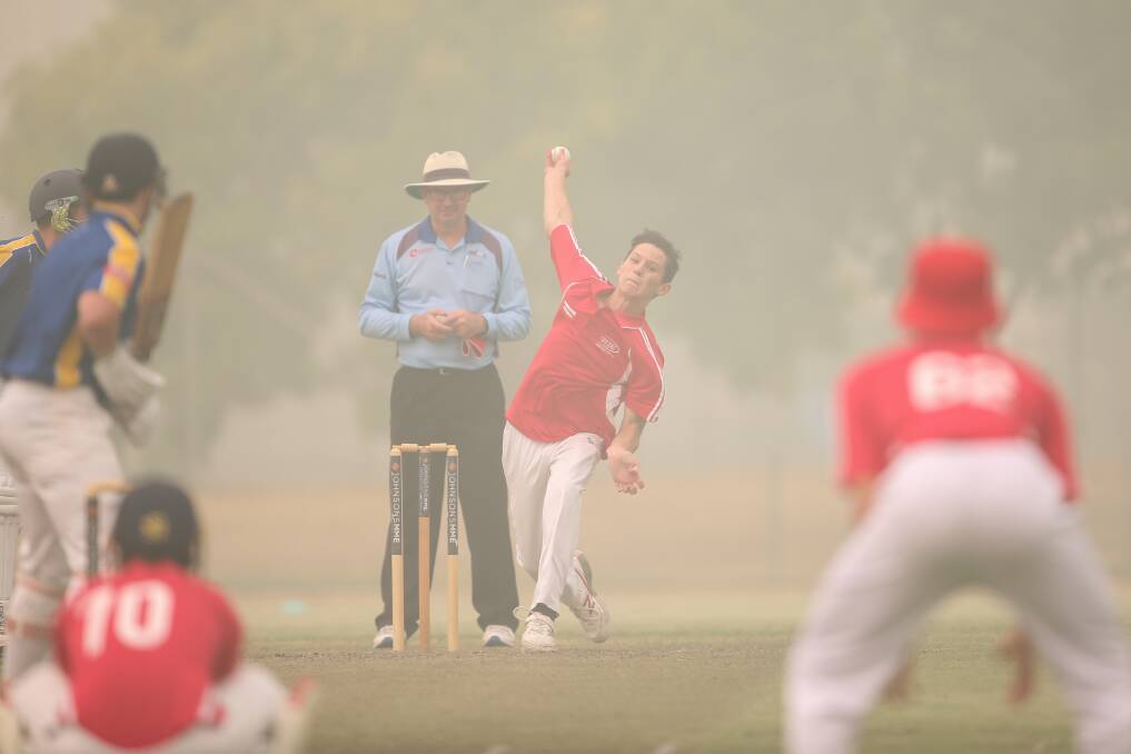 THROUGH THE HAZE: Cricket Albury-Wodonga's Lachlan Harvey bowls through a thick covering of bushfire smoke at this year's Junior Country Week.