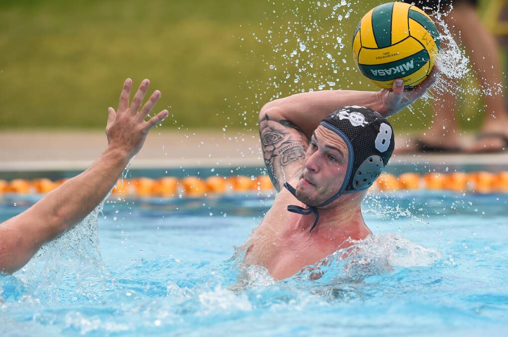 LONG SHOT: Pool Pirates' Peter Fenny attempts to find the back of the net against Bendigo during the Victorian Country Water Polo Championships. Pictures: MARK JESSER