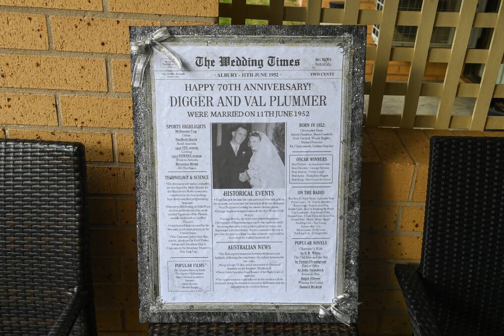 MILESTONE: Kenneth and Val Plummer's wedding photo displayed on a newspaper clipping with some of the major events of 1952. Picture: MARK JESSER