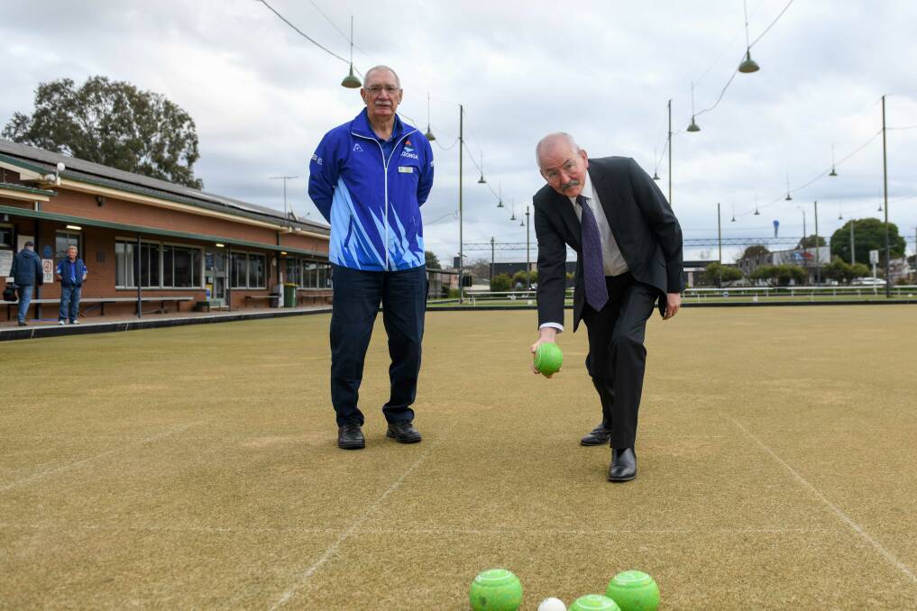 Wodonga Bowling Club president Graham Searle and Wodonga mayor Ron Mildren in June 2023 seeking funding to weatherproof the city's bowling greens as part of the 2026 Commonwealth Games legacy. Picture by Tara Trewhella