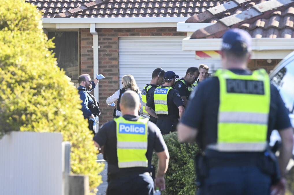 Police swarm a unit on Donelly Avenue in West Wodonga on Wednesday, April 3, in relation to a pursuit in the city that saw a police helicopter called in to assist. Picture by Mark Jesser