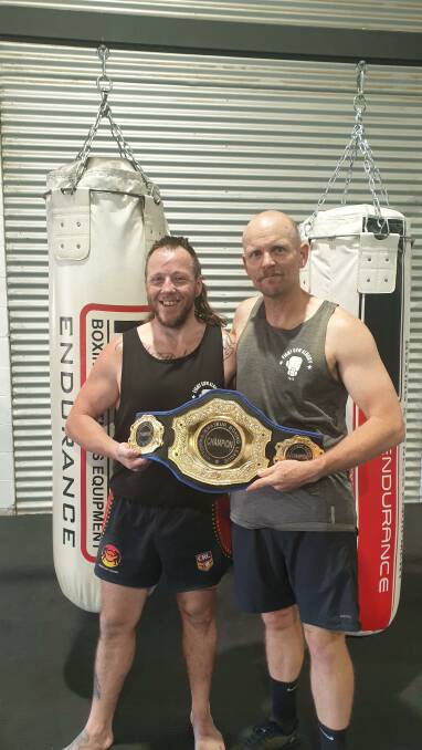Tony Kennedy with trainer Rob Sharpe from Fight Gym in Albury.