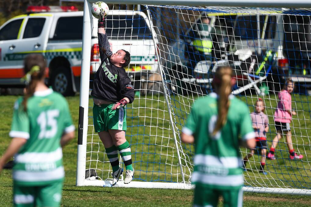 FULL STRETCH: Albury United goalkeeper Jarlisa Quinlivan keeps the ball out of the net. Picture: MARK JESSER