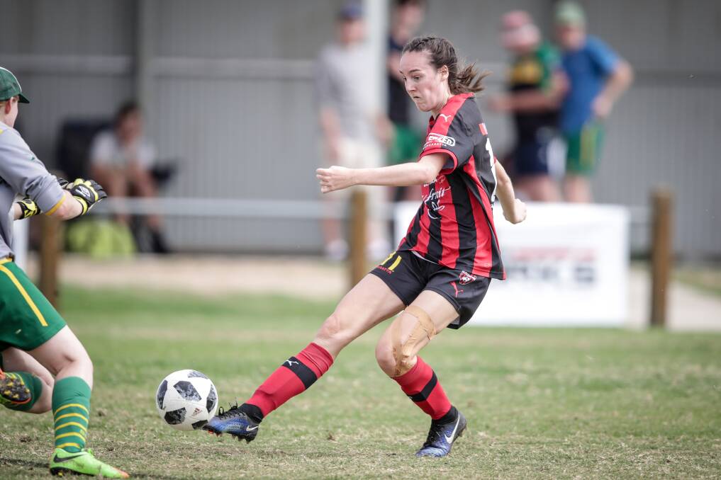MASSIVE GAME: Wangaratta's Alice Townsend will play a key role in keeping the Red Devils' AWFA senior women's league title hopes alive this weekend.
