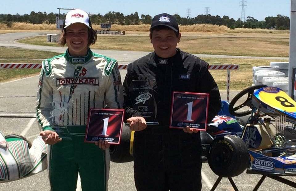 CHEQUERED FLAG: Albury-Wodonga karters Scott Chaston and Casey Fenton show off their silverware after successful seasons in the NSW Southern Stars series.