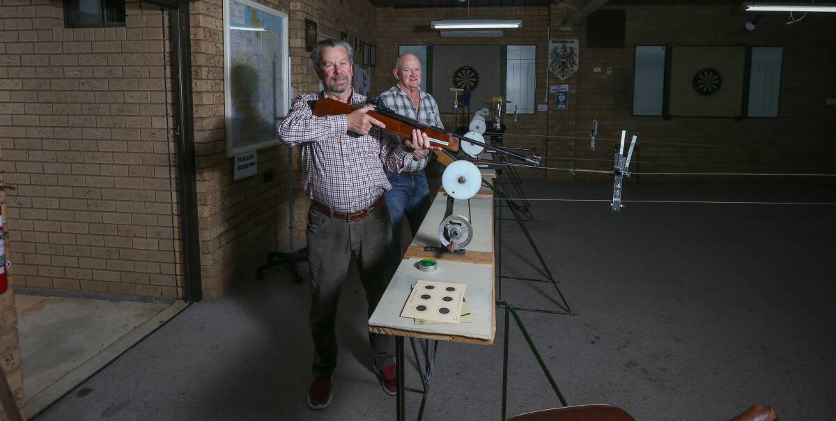 TAKING AIM: University of the Third Age Albury-Wodonga students Richard Sevil and Keith Glossop prepare for an air rifle lesson at Wodonga's German Austrian Australian Club. The club's history with air rifle shooting spans more than 50 years. Picture: TARA TREWHELLA