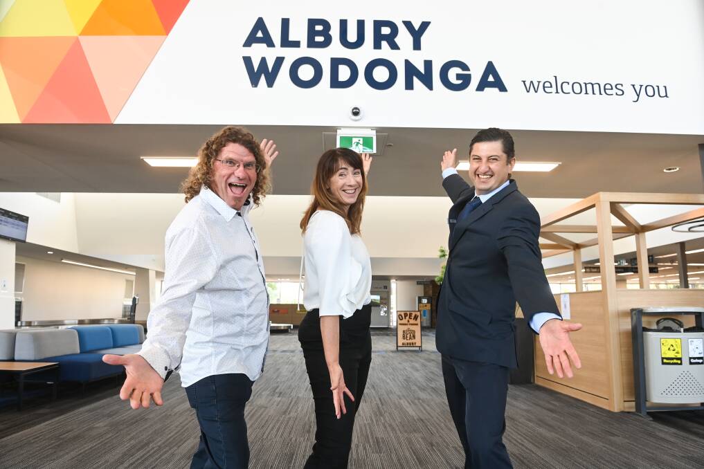 COME ON DOWN: Albury Council deputy mayor Steve Bowen, mayor Kylie King and Albury Airport team leader Nick Politis can't wait for flights between the Border city and the Sunshine Coast to begin. Picture: MARK JESSER