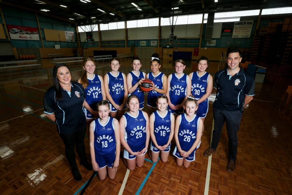 WATCH OUT: Albury's under-14 representative girls basketballers (back row) manager-assistant coach Caroline McCowan, Ellie Lyons, Jorja Stevens, Olivia Telford, Kijana McCowan, Rose Bell, Ruby Moona, coach Clinton Lowe, (front row) Ava Lowe, Leah Blakemore, Charlie Gibson and Harriet Hogg are set to contest the national titles in September. Picture: TARA TREWHELLA