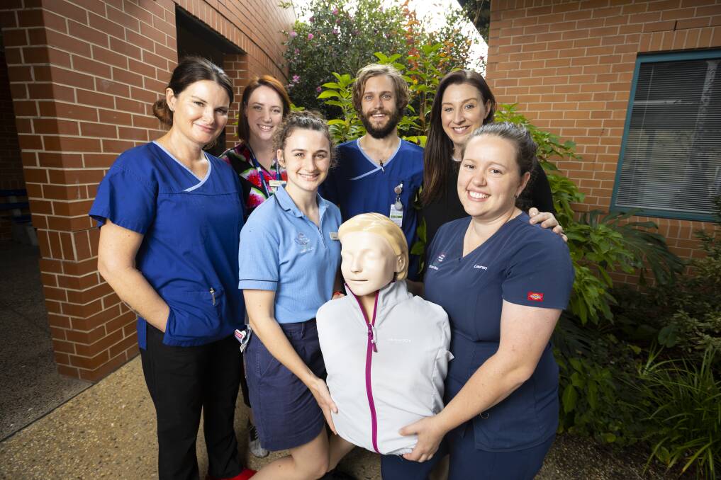 KEEN: Cosmetic nurse Kellie Jackson, dietitian Melanie Smith, physiotherapist Georgia Coburn junior doctor Michael Hussey, allied health educator Megan Tankard and registered nurse Lauren Mullavey are excited for Albury Wodonga Health's carers in health forum at La Trobe University on Friday. Picture: ASH SMITH