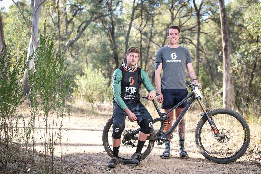 DYNAMIC DUO: Dean Lucas is rapt to have childhood mate Darcy Wilkinson as his mechanic on tour ahead of another huge year of downhill mountain bike racing. Picture: JAMES WILTSHIRE