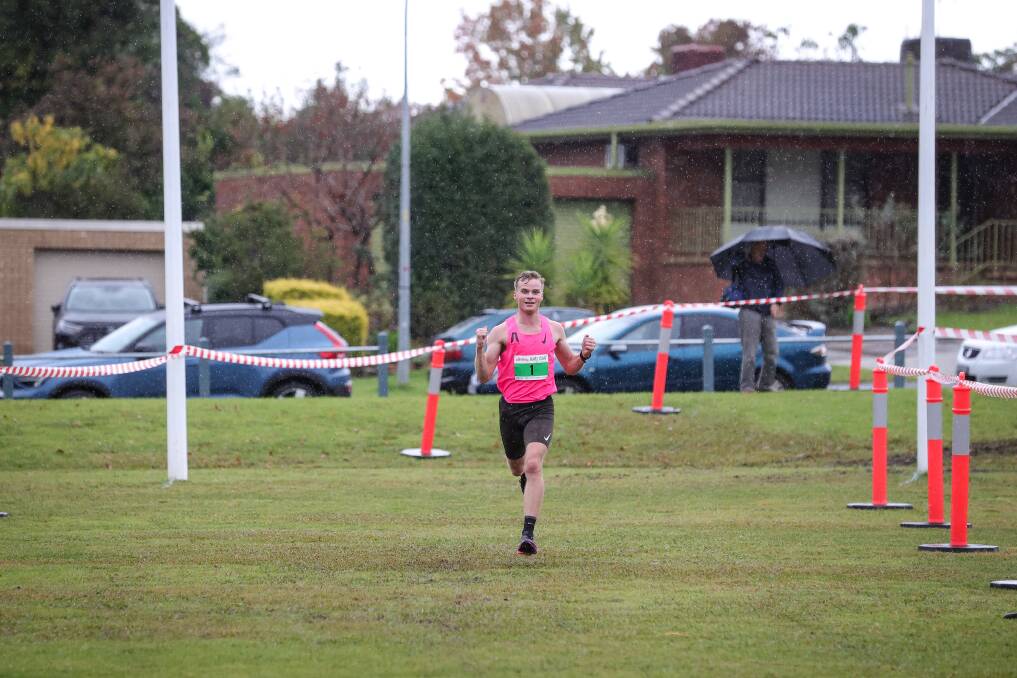 Paddy Stow approaches the finish line to claim his third successive Nail Can Hill Run in 2023. Picture by James Wiltshire