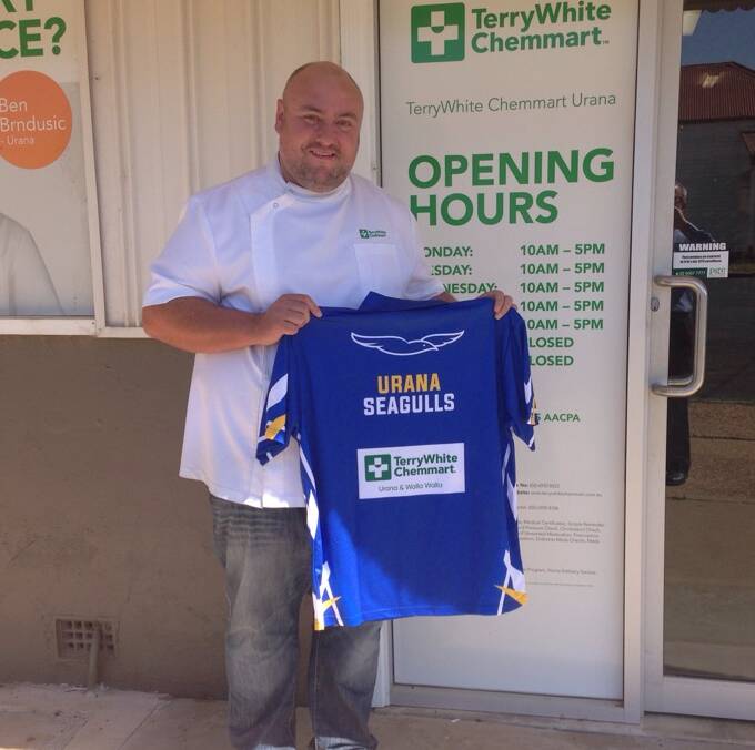 Ben Brndusic, from Terry White Chemist in Urana, with one of the new Urana Seagulls bowling shirts.