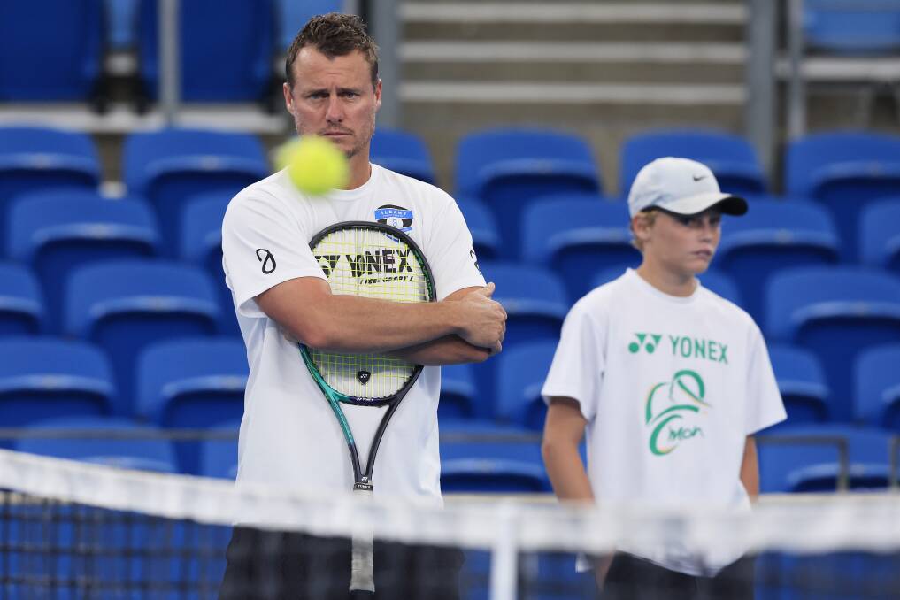 STAR ARRIVAL: Two-time Grand Slam champion Lleyton Hewitt could be on the Border this week with his son Cruz (right) playing in Albury. Picture: MARK EVANS/GETTY IMAGES