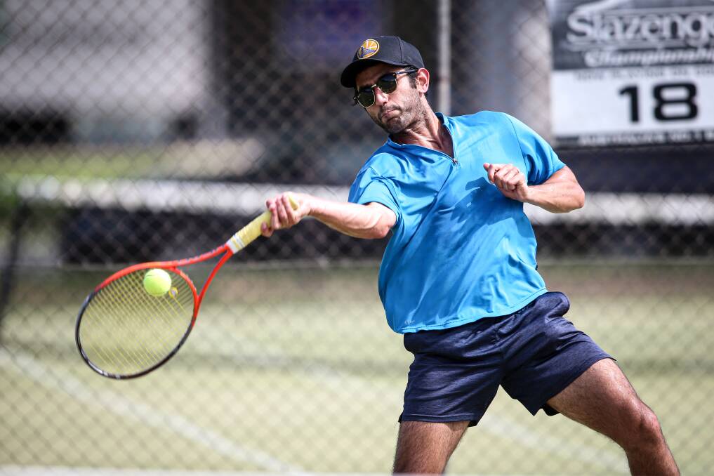 IN CONTROL: Adib Golshan nails a forehand in a big win for St Pats Hilfiger in weekend pennant at the Albury grasscourts. Picture: JAMES WILTSHIRE