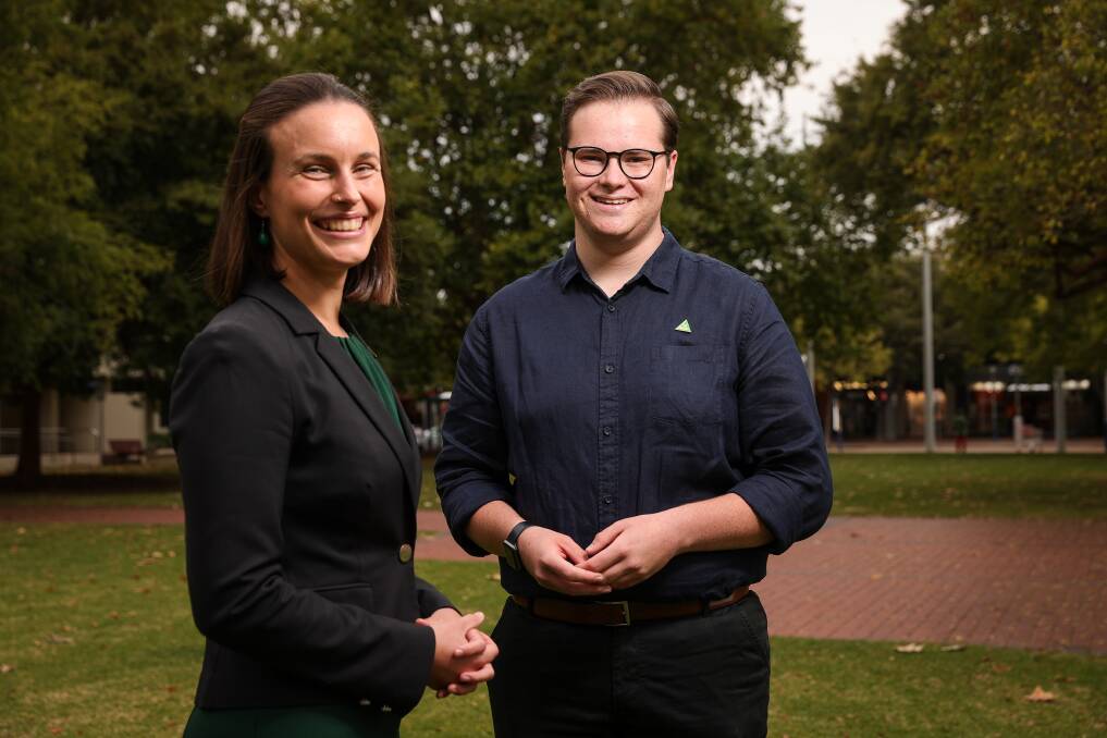 TEAM GREEN: Former Albury Council deputy mayor Amanda Cohn catches up with the Greens' candidate for Farrer Eli Davern at the launch of his federal election campaign in Albury on Wednesday. Picture: JAMES WILTSHIRE