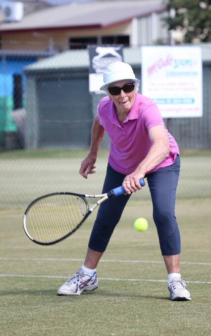 REACH: Howlong's Chris Denby watches the ball onto her racquet during Albury Tennis Association's Tuesday ladies pennant grand finals. She remained unbeaten to help Connelly to the section three title yesterday. Picture: KYLIE ESLER