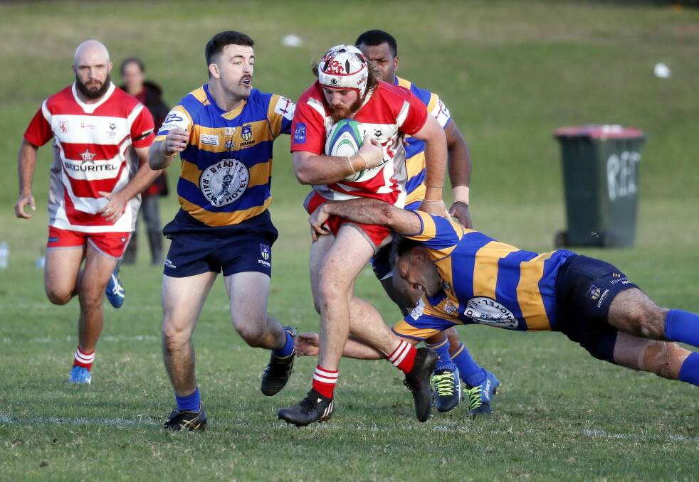 DESPERATION: The Albury-Wodonga Steamers defence thwarts a CSU attack during the Border side's victory at Beres Ellwood Oval on Saturday. Picture: LES SMITH