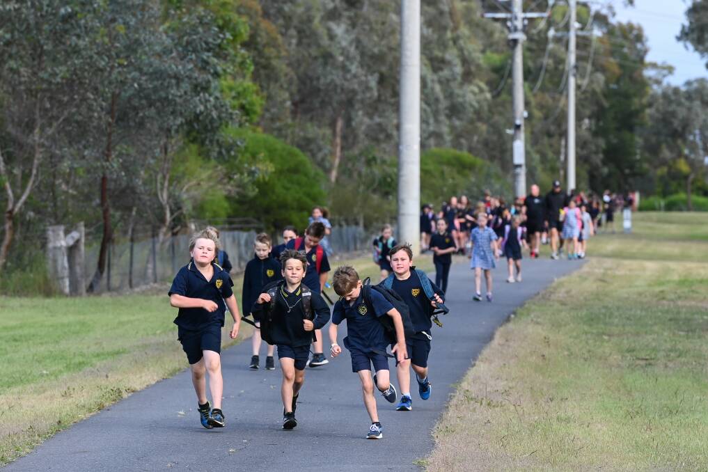 PACESETTERS: This group of students led the way to Bandiana Primary School on the final day of Walk to School October on Friday. Picture: MARK JESSER