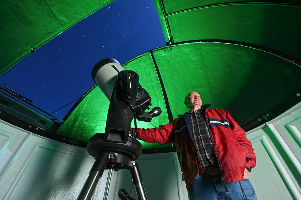 STARGAZER: Tallangatta and District Astronomy Club member Wayne Middleton inside the club's recently acquired observatory at the showgrounds. The three-metre dome provides a clear line of sight. Picture: MARK JESSER