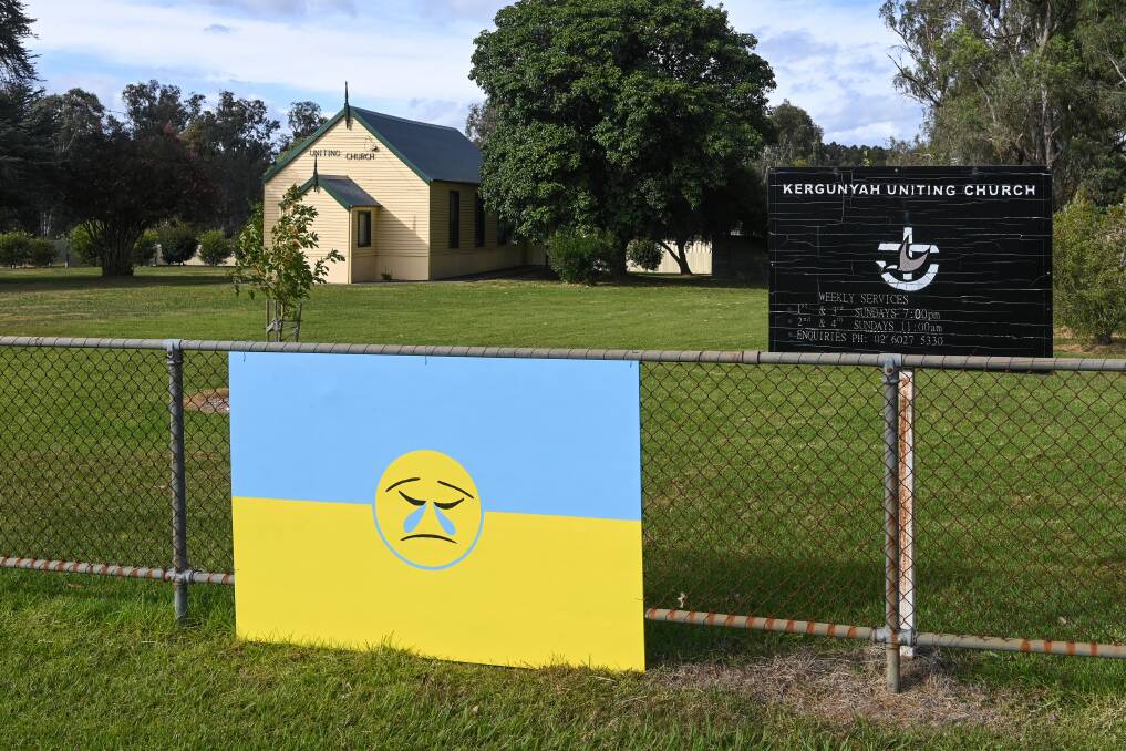 SHOW OF SUPPORT: An image of the Ukraine sign designed by Kergunyah's Graham Sutcliffe outside of the town's Uniting Church. Picture: MARK JESSER