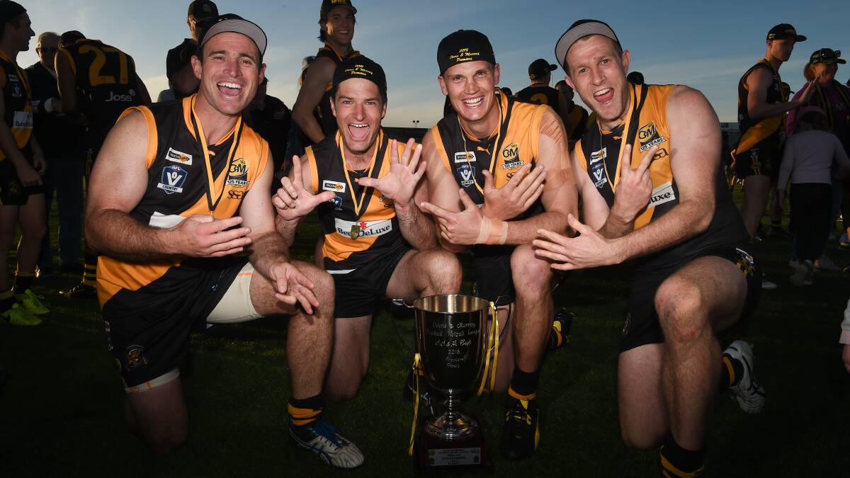 HOME TO NEST: Michael Thompson (third from left) has returned to his home club Kiewa-Sandy Creek after winning his seventh premiership at Albury this year. Picture: MARK JESSER