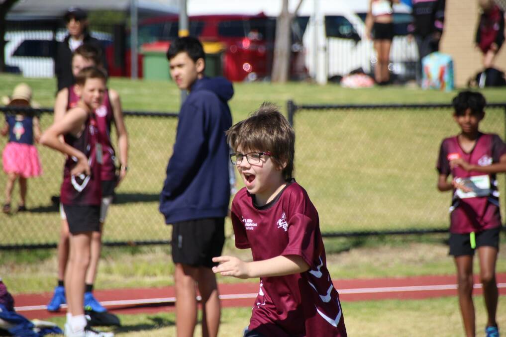 HAPPY AS CAN BE: Wodonga under-nines little athlete Fletcher McFarlane was excited to be back at the track on Saturday. Picture: RYAN MCMAHON