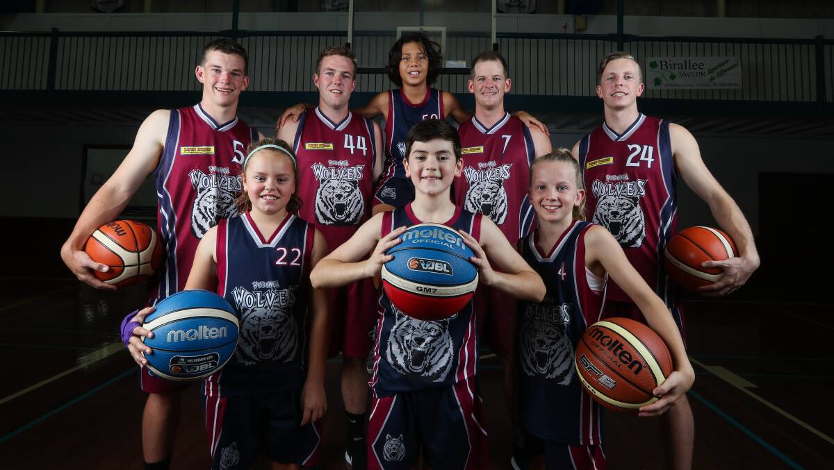 ALL SET: Wodonga Wolves seniors and junior basketballers (front) Meg Foley, 9, Josh Ivic, 12, Piper Godden, 10 (back) Blake Mills, Josh McKay, Seth Blackburn, 13, Broady Mills and Ben Coates are ready for a big weekend of basketball on their home court. Picture: MARK JESSER