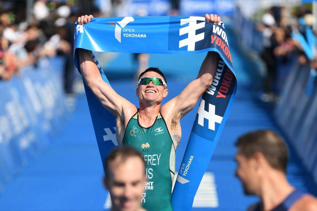 VICTORY: Albury's Justin Godfrey with a vital win in the World Triathlon Championship Series event in Yokohama earlier this month. Picture: TRIATHLON AUSTRALIA