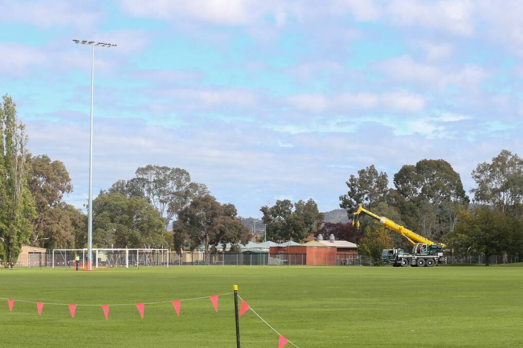 PROGRESS: Light poles have been installed on Albury United's side of Jelbart Park and will be ready to be tested next week. Picture: TARA TREWHELLA