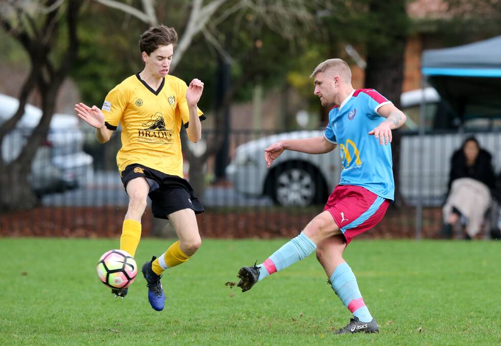 Tyler Curran (right) playing for Twin City Wanderers against Albury Hotspurs on Sunday, June 17.