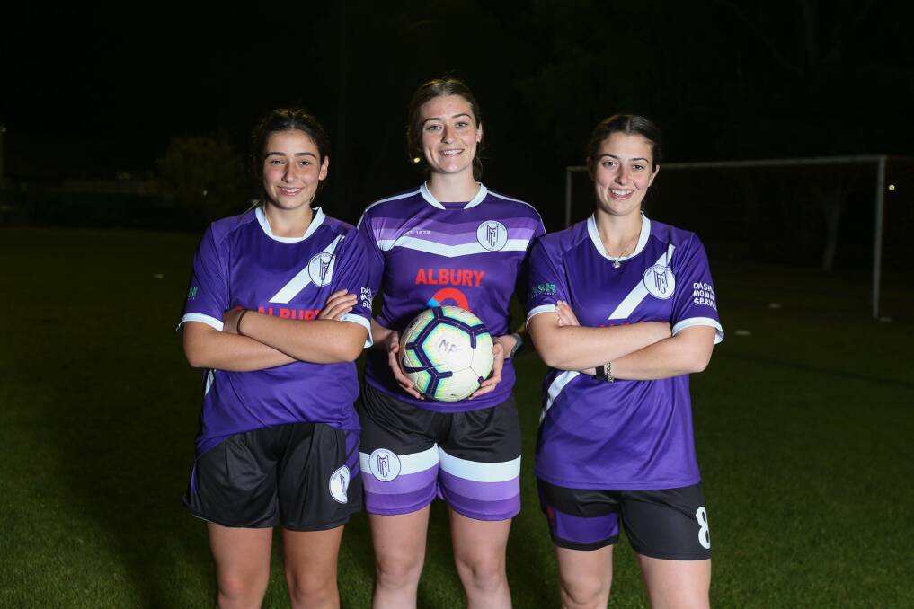 THREE'S A CROWD: Sisters Eva, Maya and Alex Davis are playing their second season together with Melrose's senior women. Picture: TARA TREWHELLA